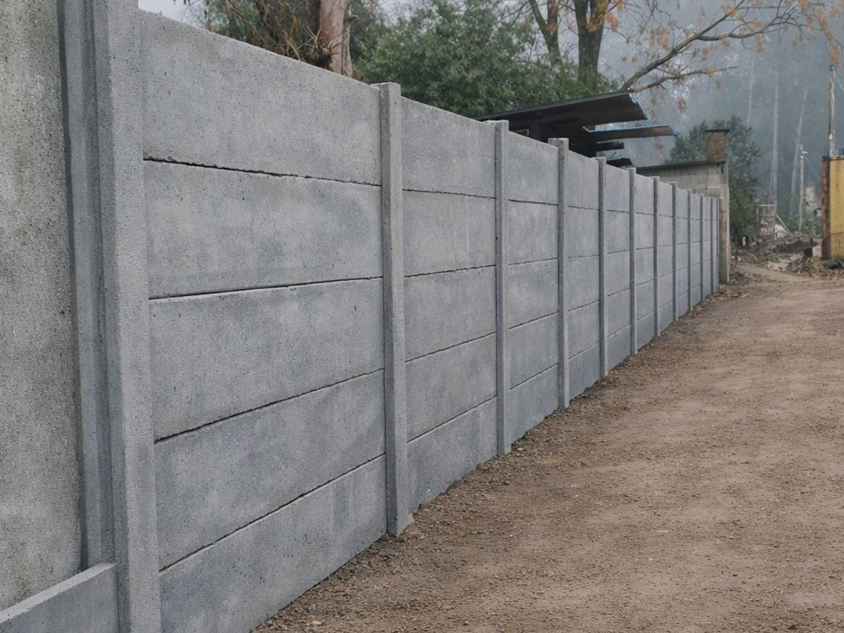 Complejo Residencial Carrasco Norte - muro premoldeado 2 m